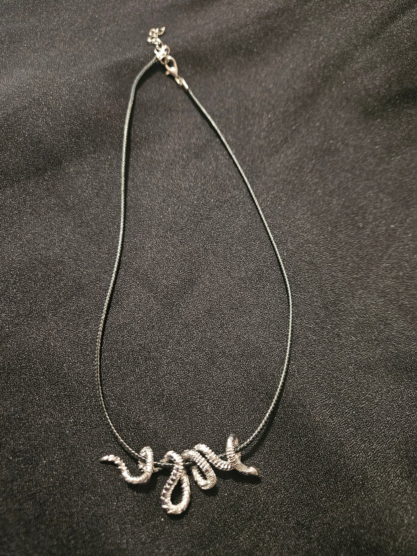 Engraved steel snake necklace