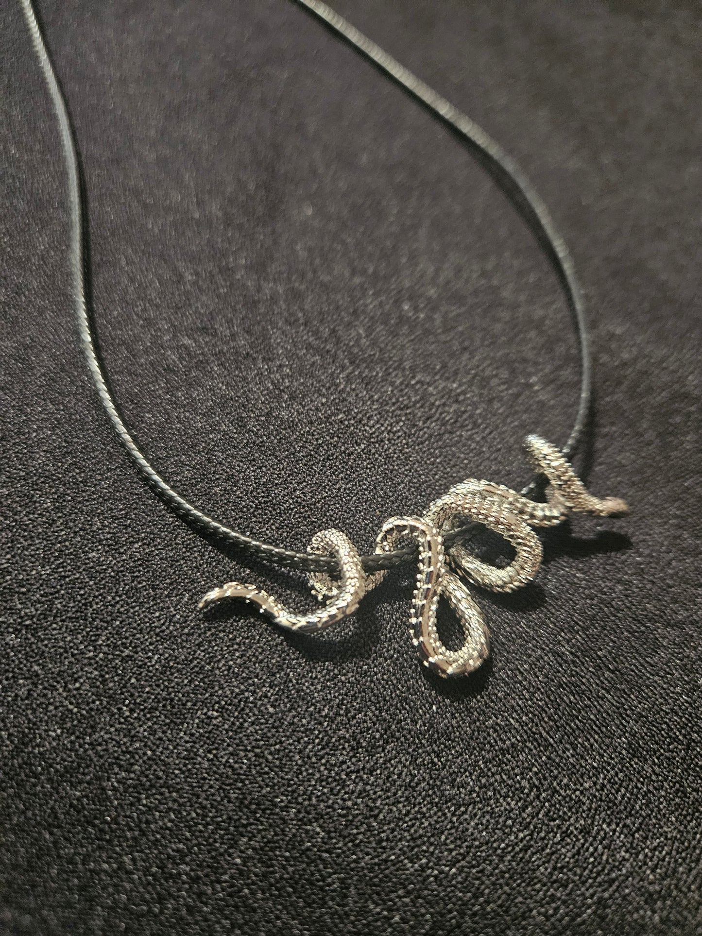 Engraved steel snake necklace