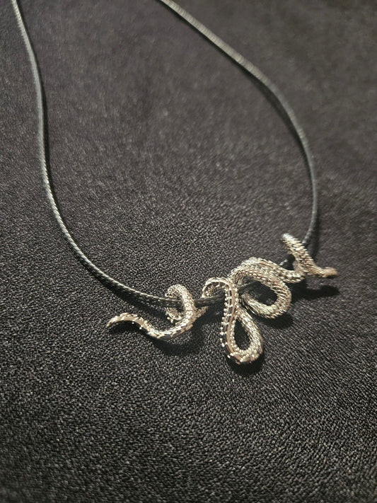 Engraved steel snake necklace